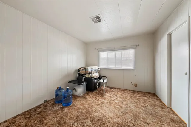 a room with furniture and a window