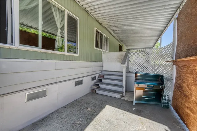 a view of outdoor space and barbecue grill