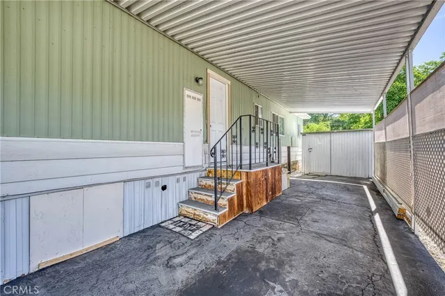 a view of entryway with wooden stairs