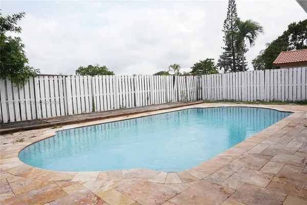 a view of a swimming pool on a terrace