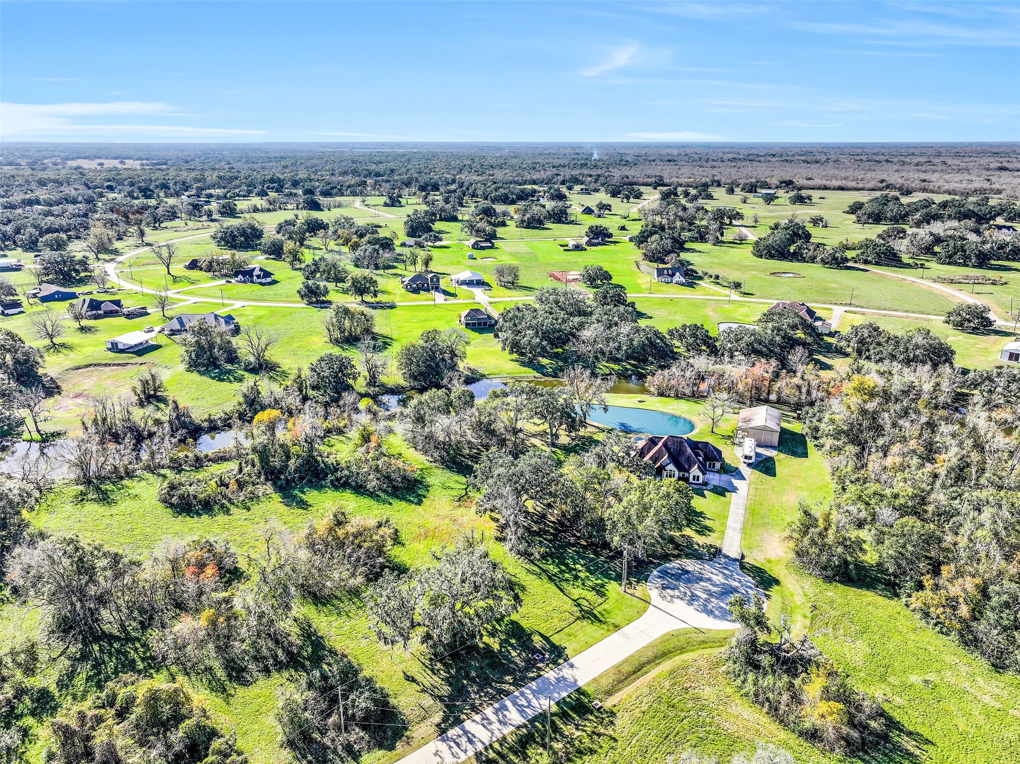 1031 Winchester Trail Angleton, TX 77515 - Photo 13 of 19 an aerial view of a residential houses with outdoor space and trees