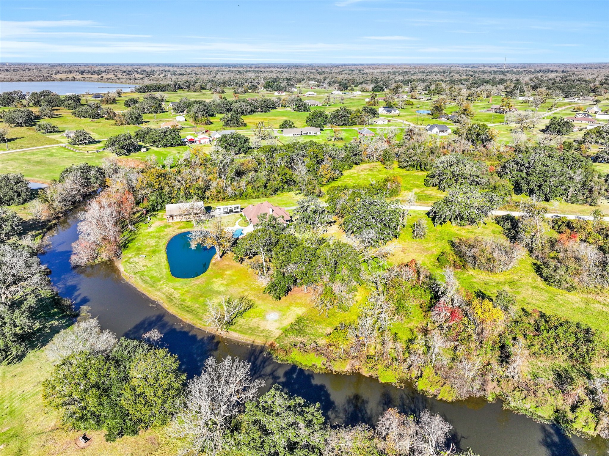 1031 Winchester Trail Angleton, TX 77515 - Photo 6 of 19 a view of residential houses with swimming pool