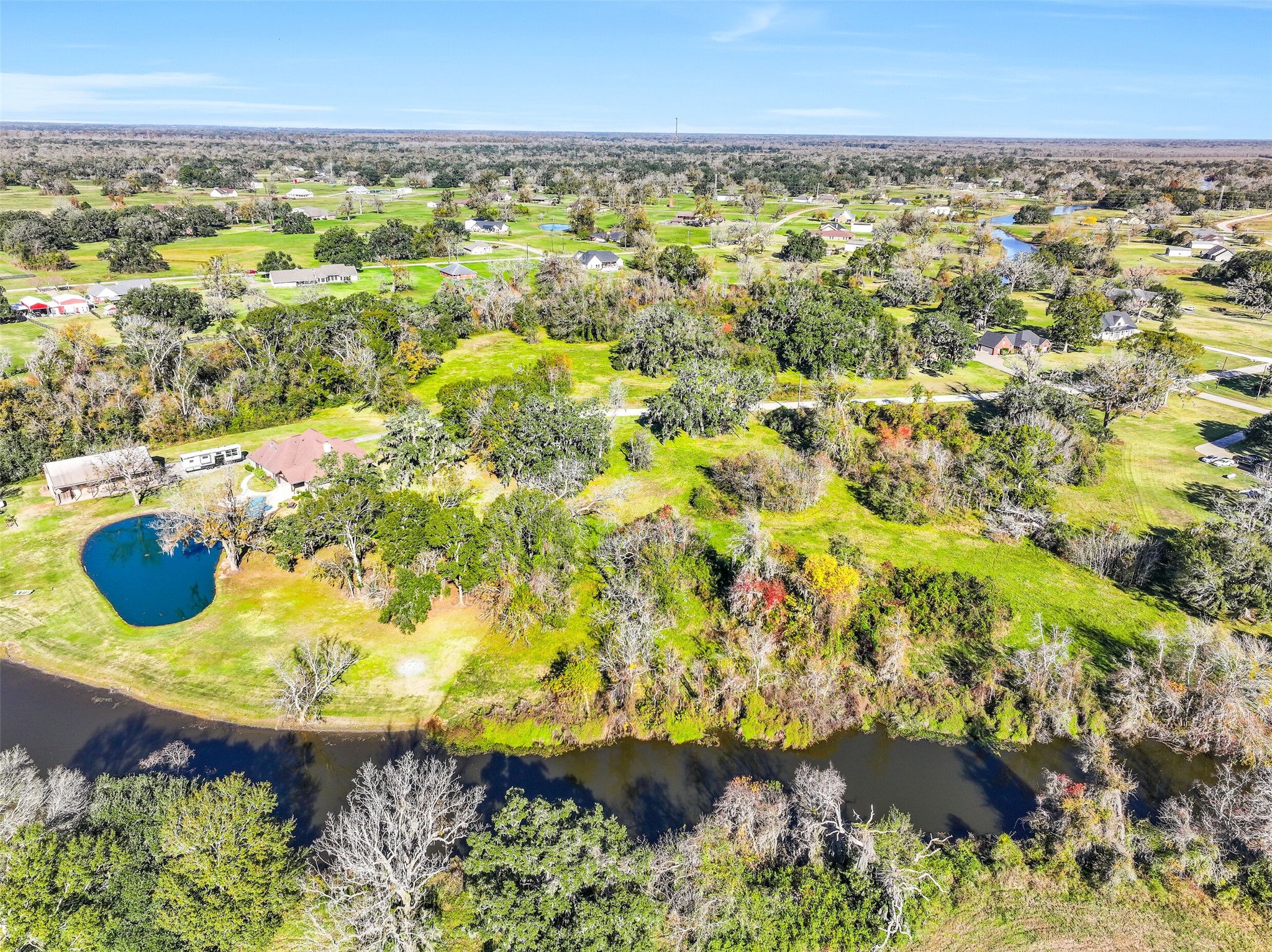 1031 Winchester Trail Angleton, TX 77515 - Photo 7 of 19 an aerial view of residential houses with outdoor space