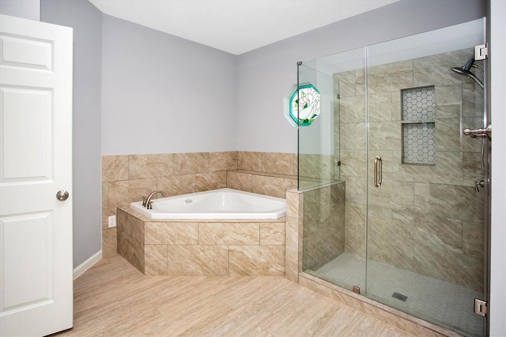 24600 Nine Bar Road Hempstead, TX 77445 - Photo 12 of 26 a bathroom with a sink and shower