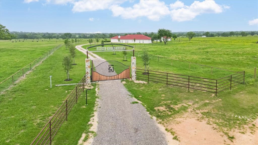 24600 Nine Bar Road Hempstead, TX 77445 - Photo 2 of 26 a view of a water pond with green space