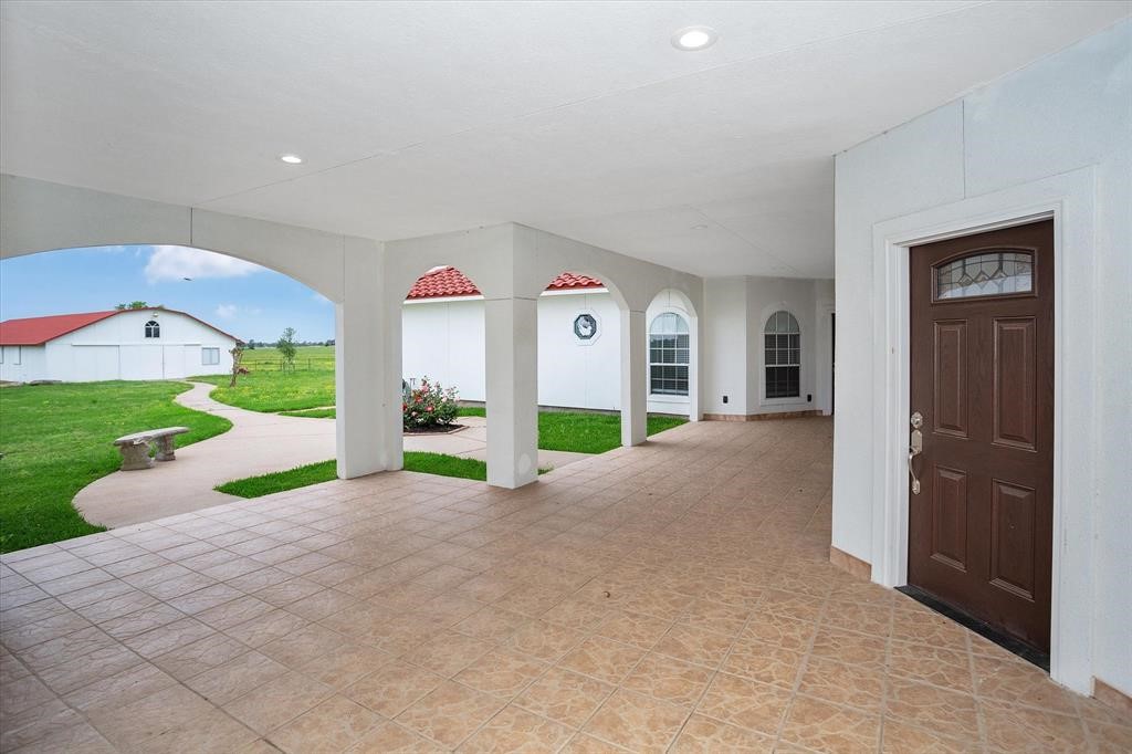 24600 Nine Bar Road Hempstead, TX 77445 - Photo 23 of 26 a view of swimming pool with an outdoor seating