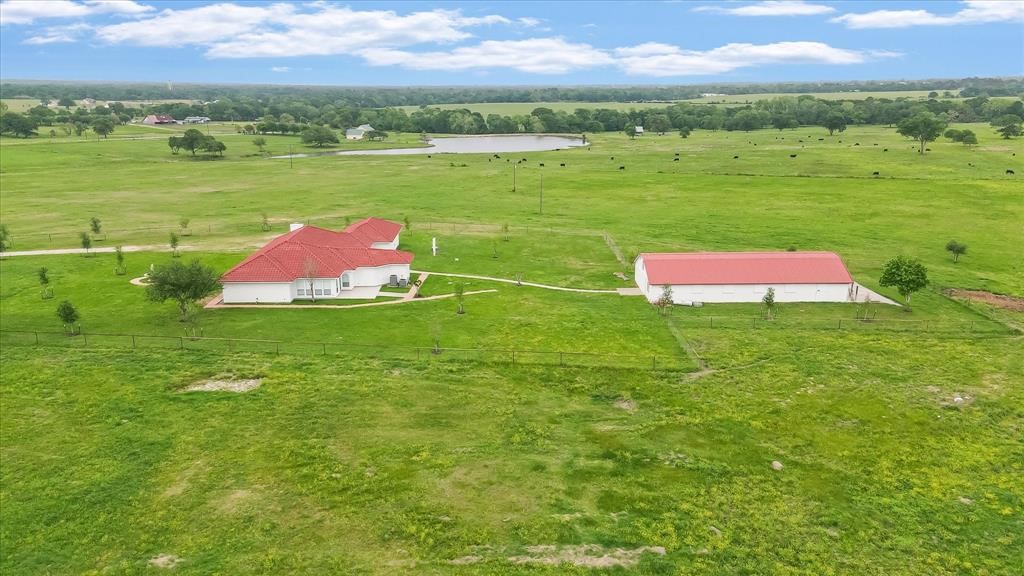 24600 Nine Bar Road Hempstead, TX 77445 - Photo 24 of 26 a view of an outdoor space and a lake view