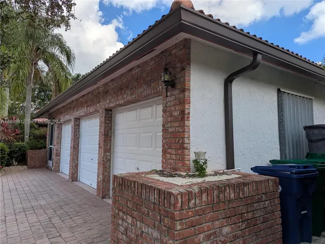 a front view of house with barbeque oven