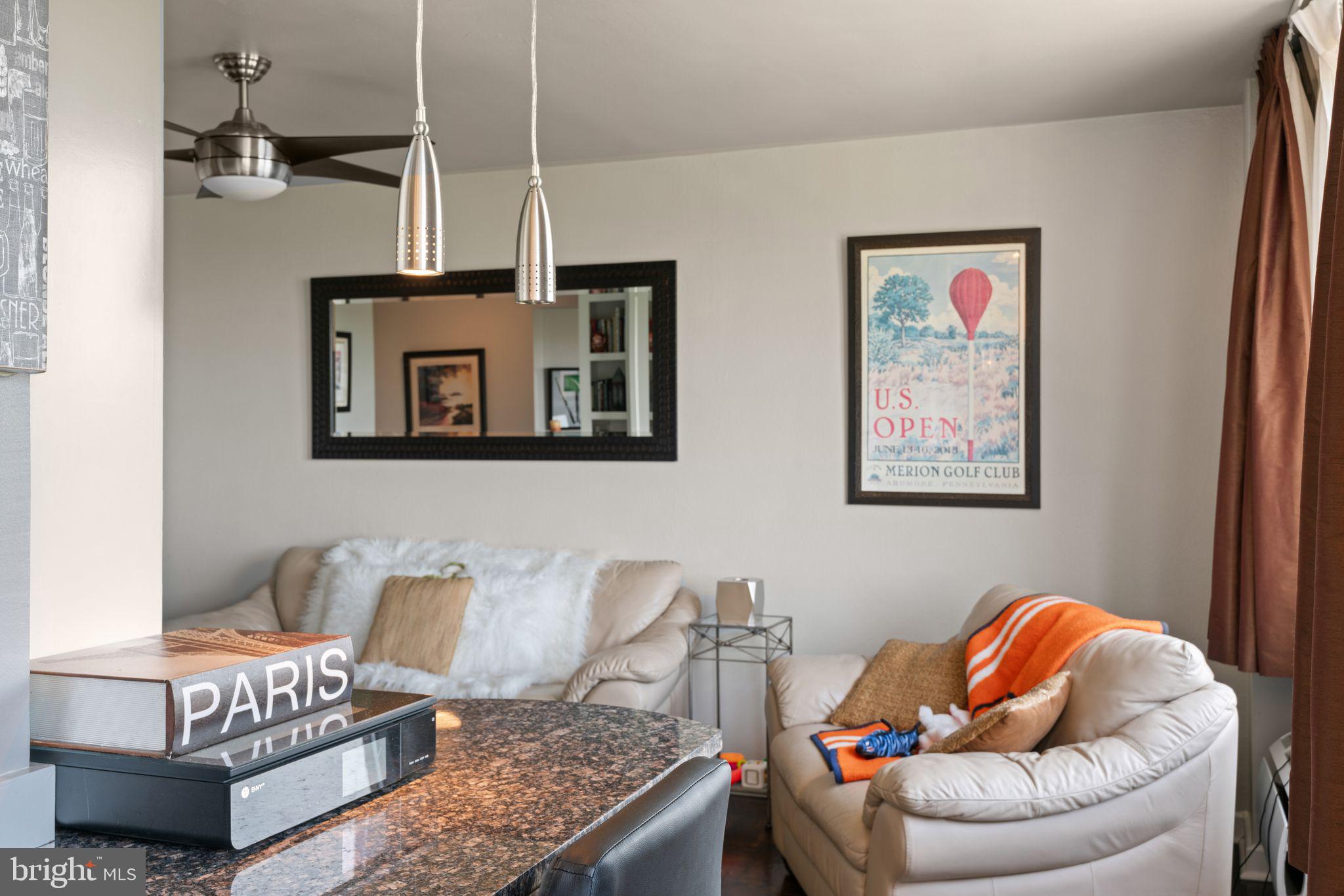 2601 Pennsylvania Avenue, Unit 846 Philadelphia, PA 19130 - Photo 11 of 40 a living room with furniture and a rug