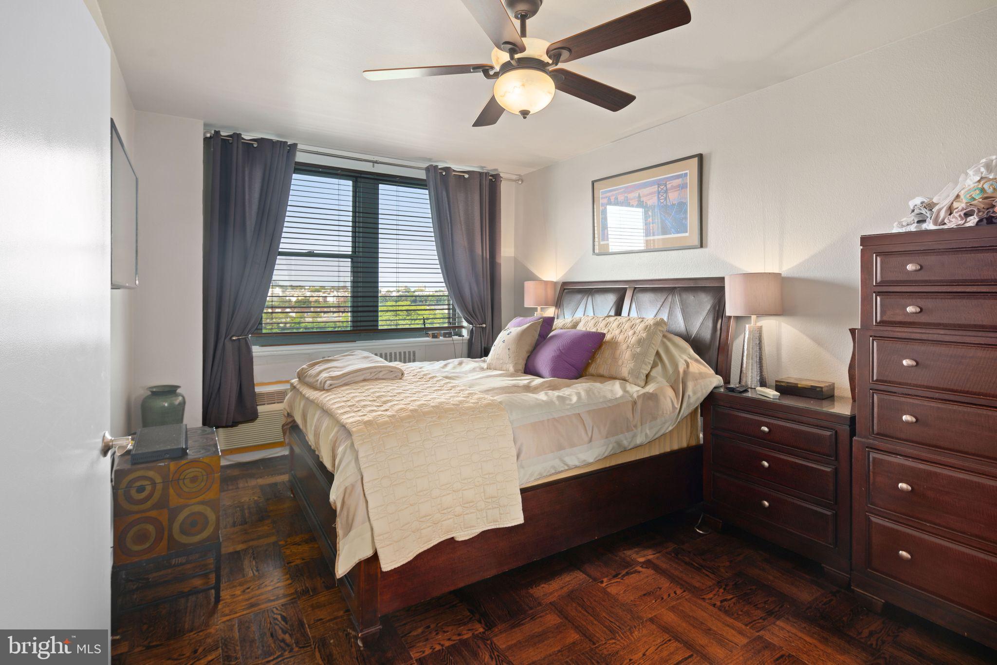 2601 Pennsylvania Avenue, Unit 846 Philadelphia, PA 19130 - Photo 27 of 40 a bedroom with a bed and window