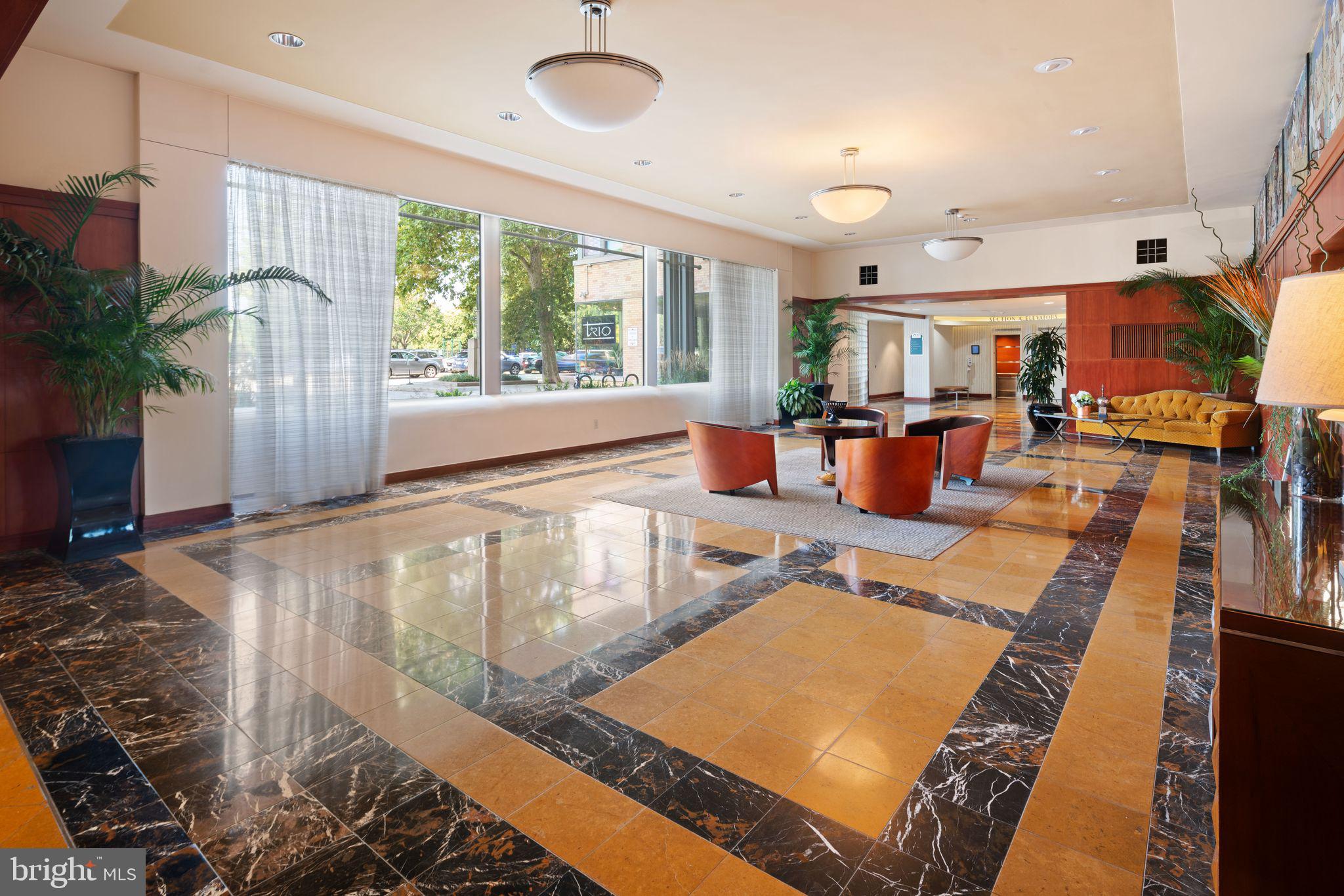 2601 Pennsylvania Avenue, Unit 846 Philadelphia, PA 19130 - Photo 33 of 40 a living room with furniture and a large window