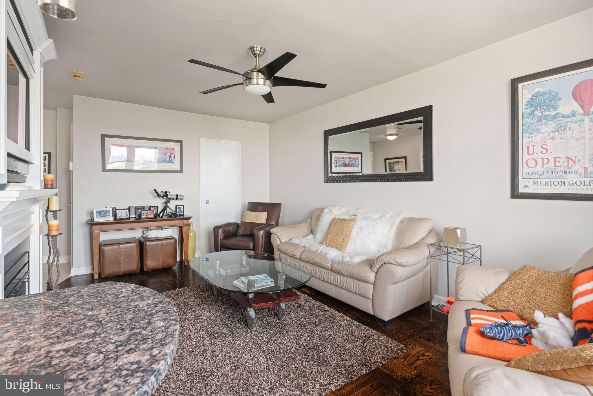 2601 Pennsylvania Avenue, Unit 846 Philadelphia, PA 19130 - Photo 4 of 40 a living room with furniture and a rug