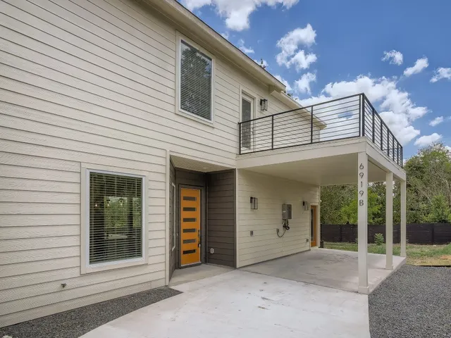 a view of a house with a porch