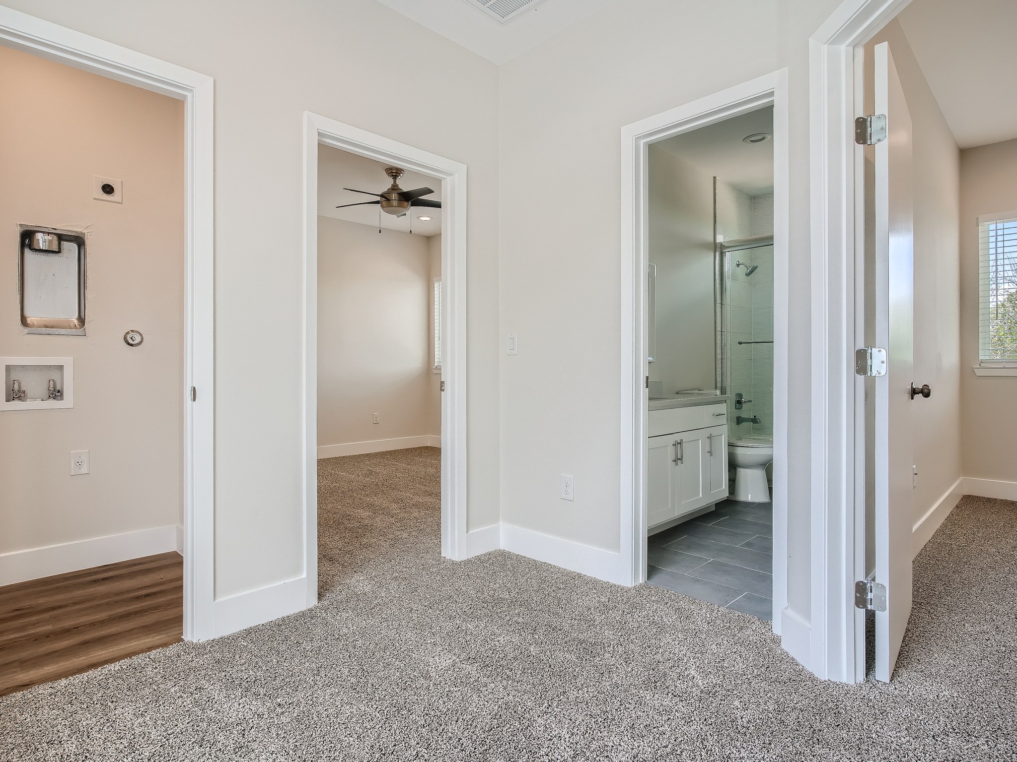 6919 Bethune Avenue, Unit B Austin, TX 78752 - Photo 14 of 17 a view of a hallway with closet and a bathroom