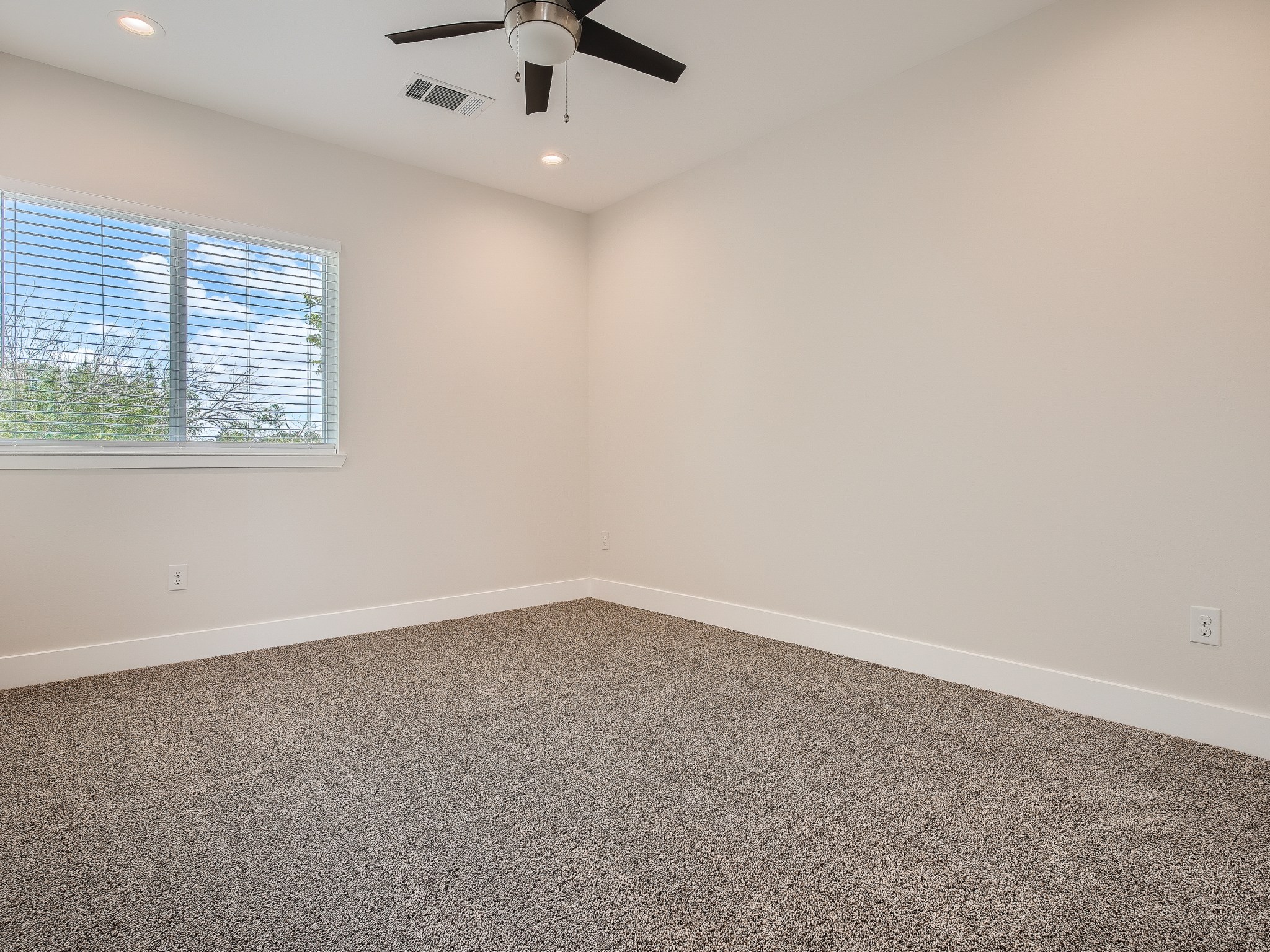 6919 Bethune Avenue, Unit B Austin, TX 78752 - Photo 10 of 17 an empty room with a window