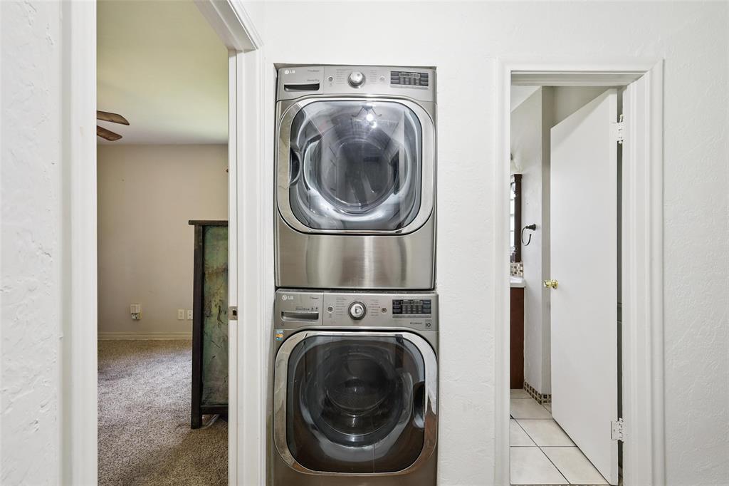 10505 Ferguson Road Dallas, TX 75228 - Photo 23 of 29 a utility room with dryer and washer