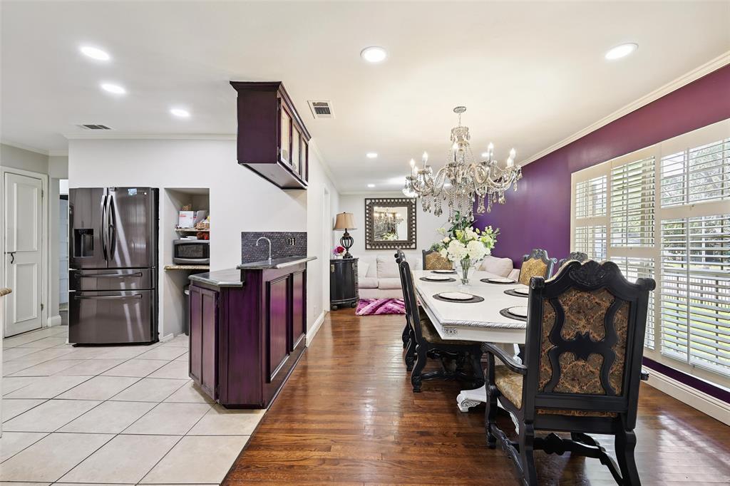 10505 Ferguson Road Dallas, TX 75228 - Photo 7 of 29 a view of a dining room with furniture window and wooden floor