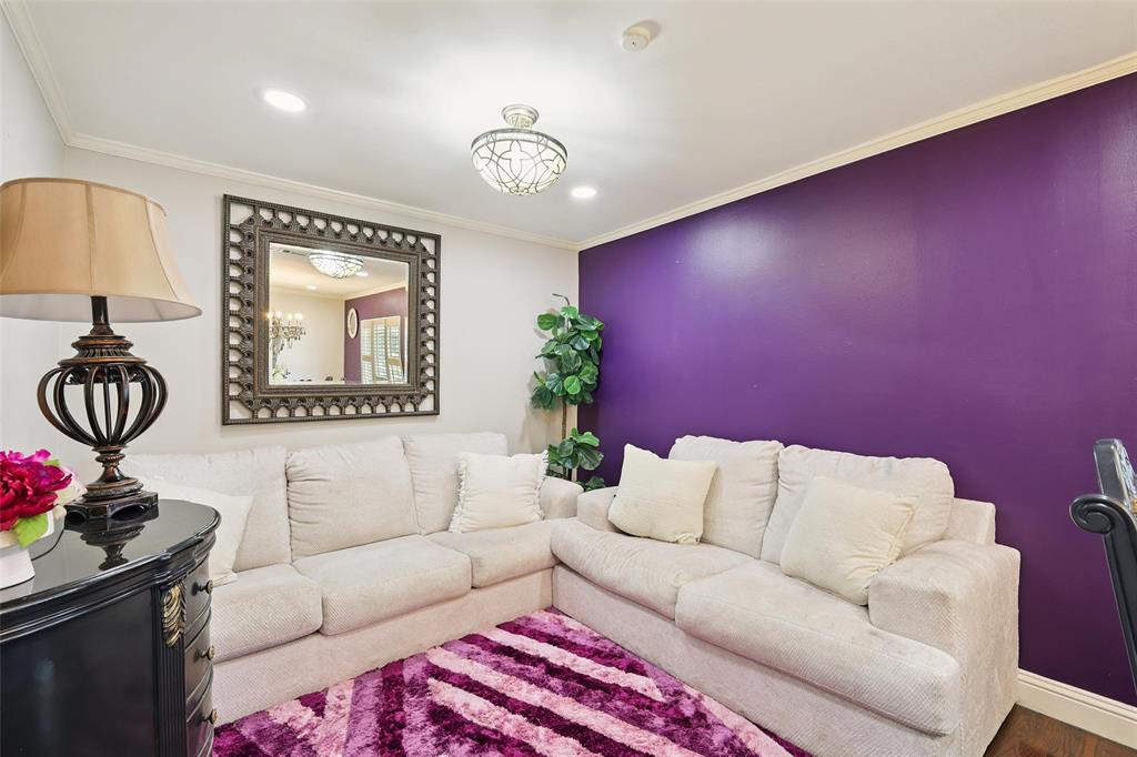 10505 Ferguson Road Dallas, TX 75228 - Photo 9 of 29 a living room with furniture and a chandelier