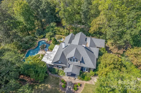 an aerial view of a house with a garden