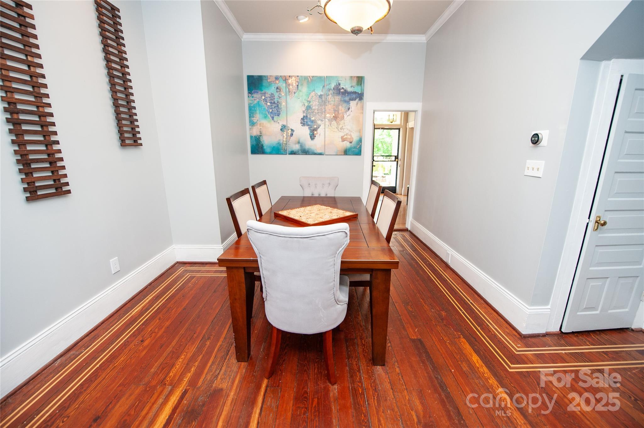 447 North Washington Street Rutherfordton, NC 28139 - Photo 12 of 48 a view of a room with wooden floor and chair