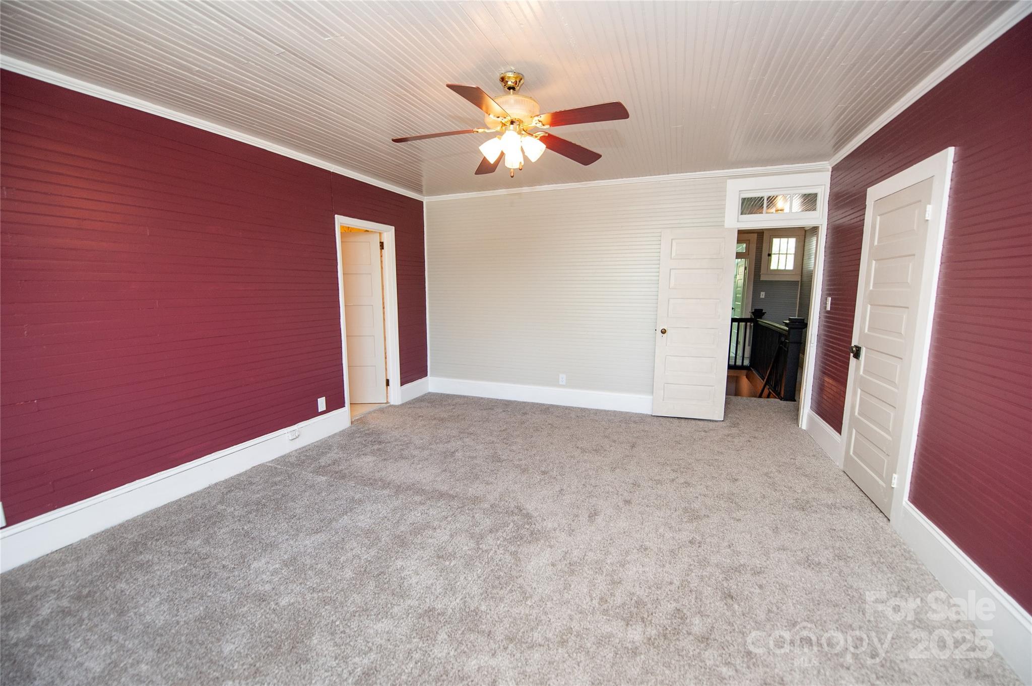 447 North Washington Street Rutherfordton, NC 28139 - Photo 24 of 48 a view of an empty room with a ceiling fan