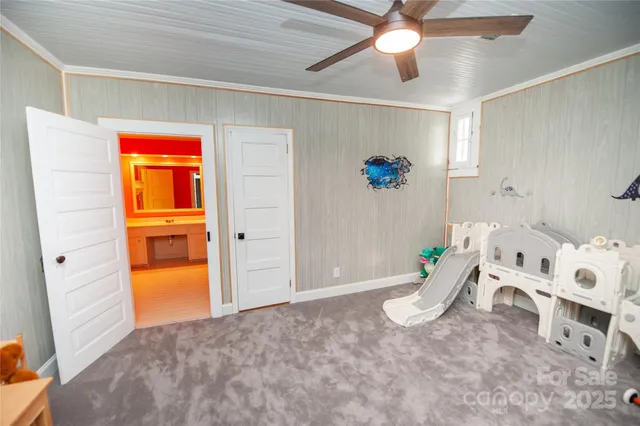 a view of livingroom with hardwood floor and ceiling fan
