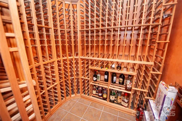 a dining room with furniture window and outside view