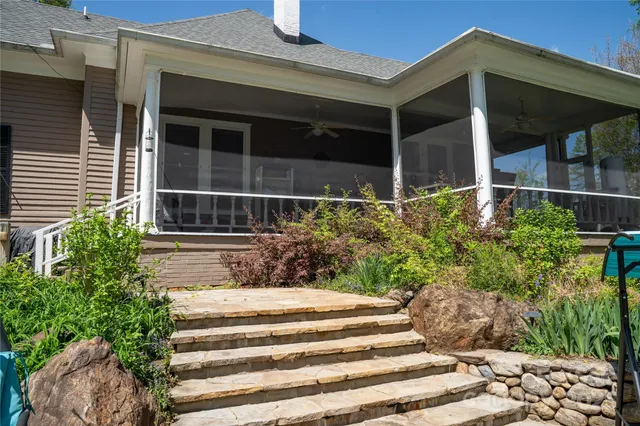 a view of a park with large trees