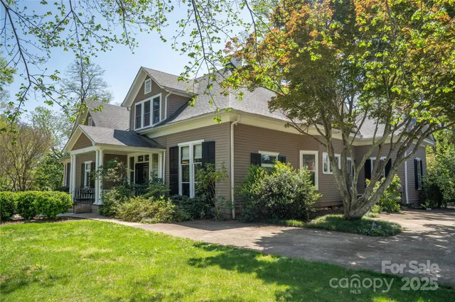 a front view of a house with a porch