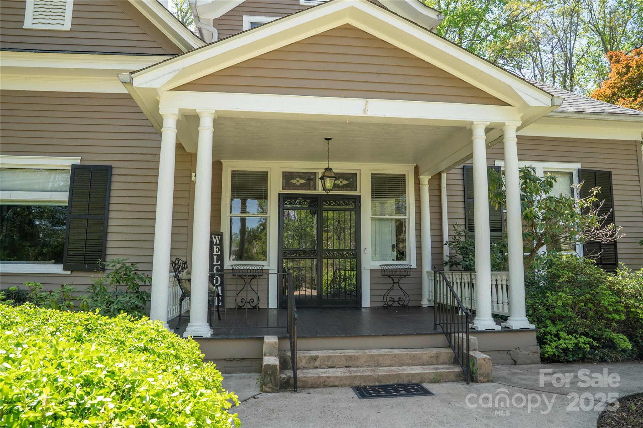 447 North Washington Street Rutherfordton, NC 28139 - Photo 46 of 48 a front view of a house with a porch