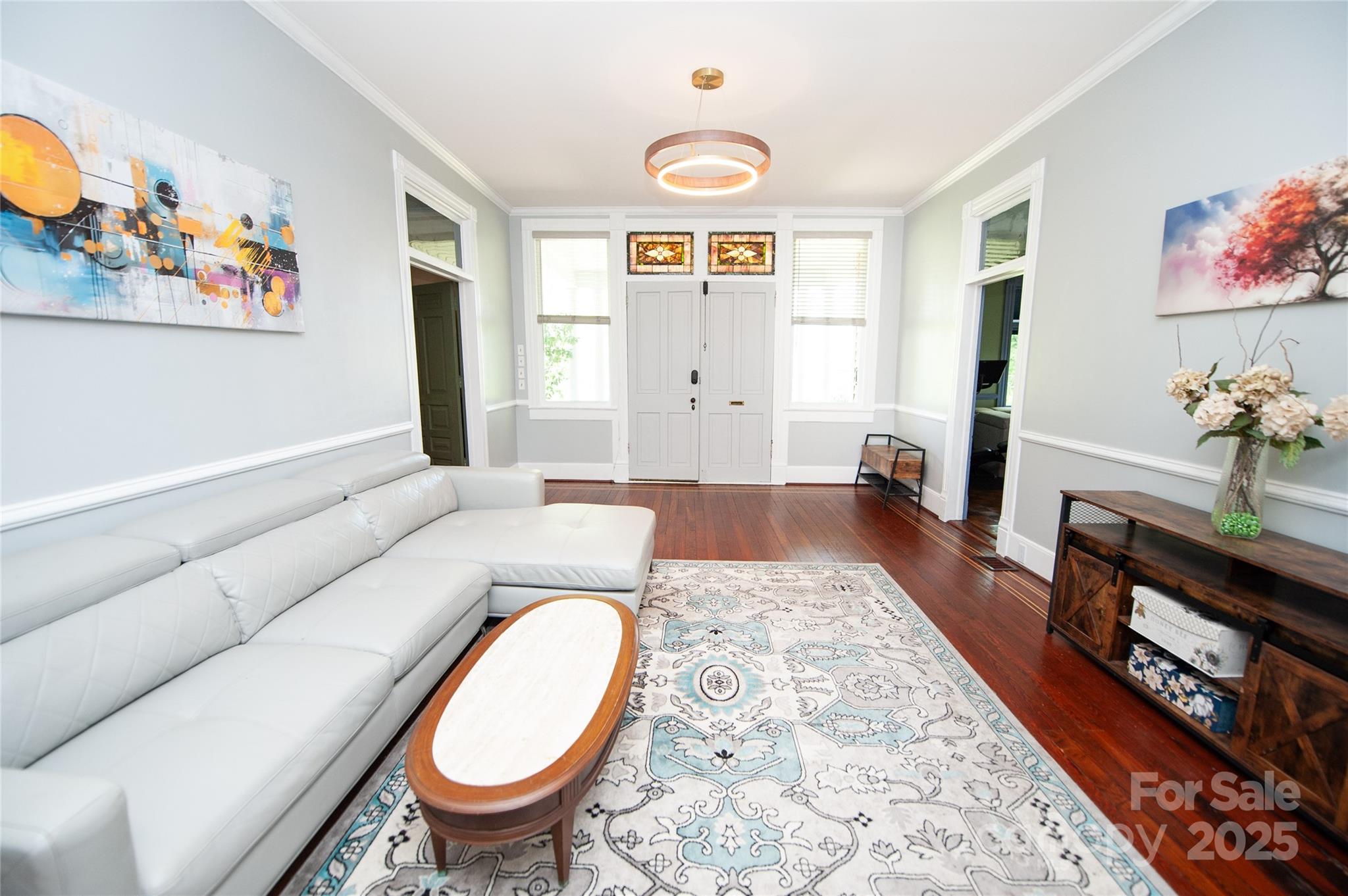 447 North Washington Street Rutherfordton, NC 28139 - Photo 7 of 48 a living room with furniture and a wooden floor