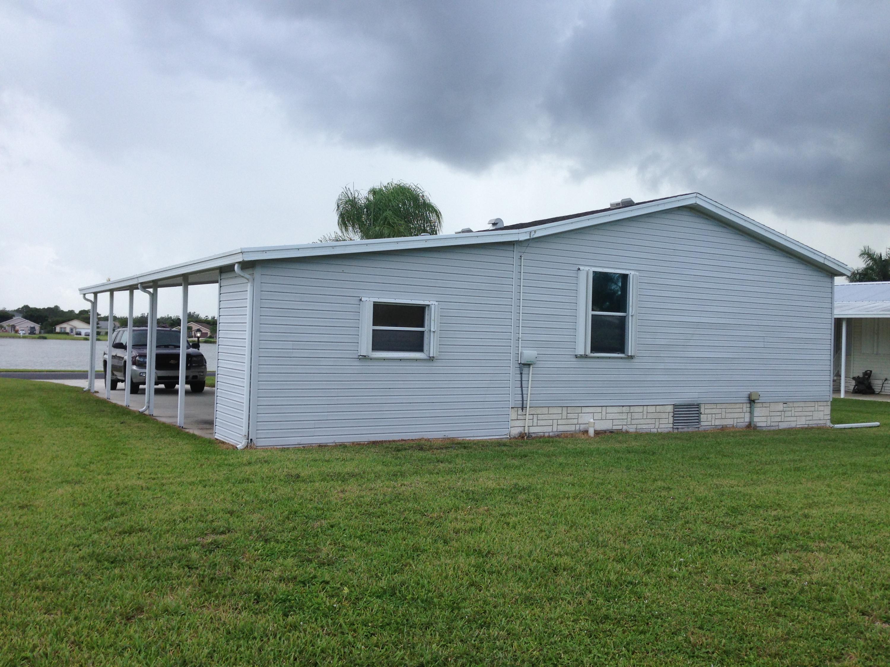 8909 Southwest Chevy Circle Stuart, FL 34997 - Photo 16 of 16 rear of home