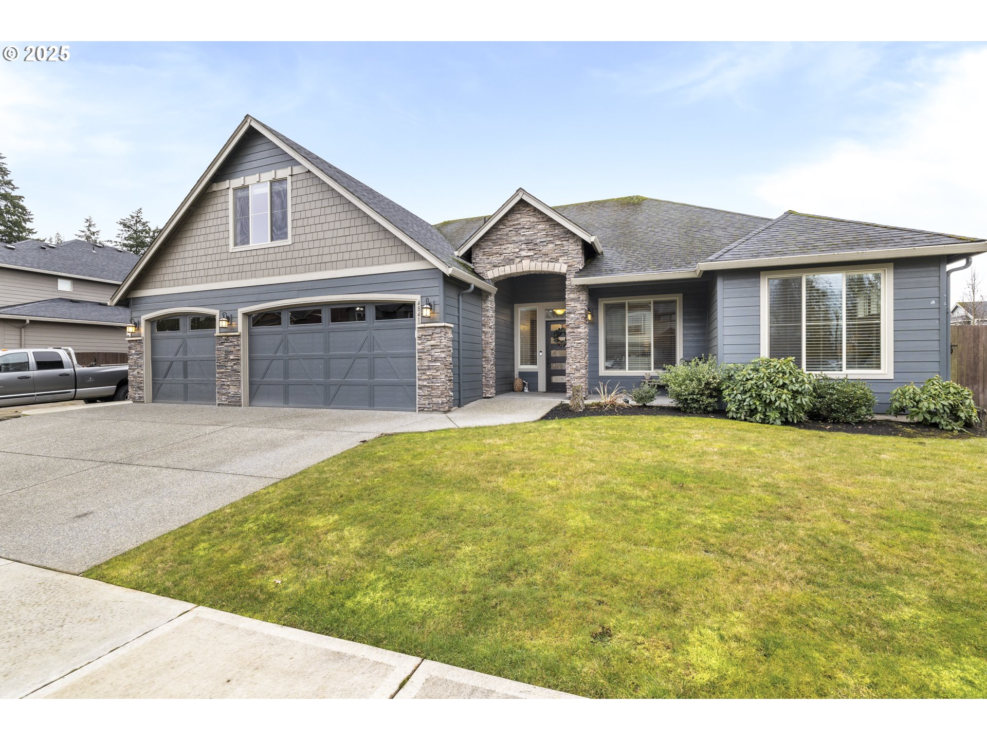 4841 North 8th Street Ridgefield, WA 98642 - Photo 42 of 48 a front view of a house with a yard
