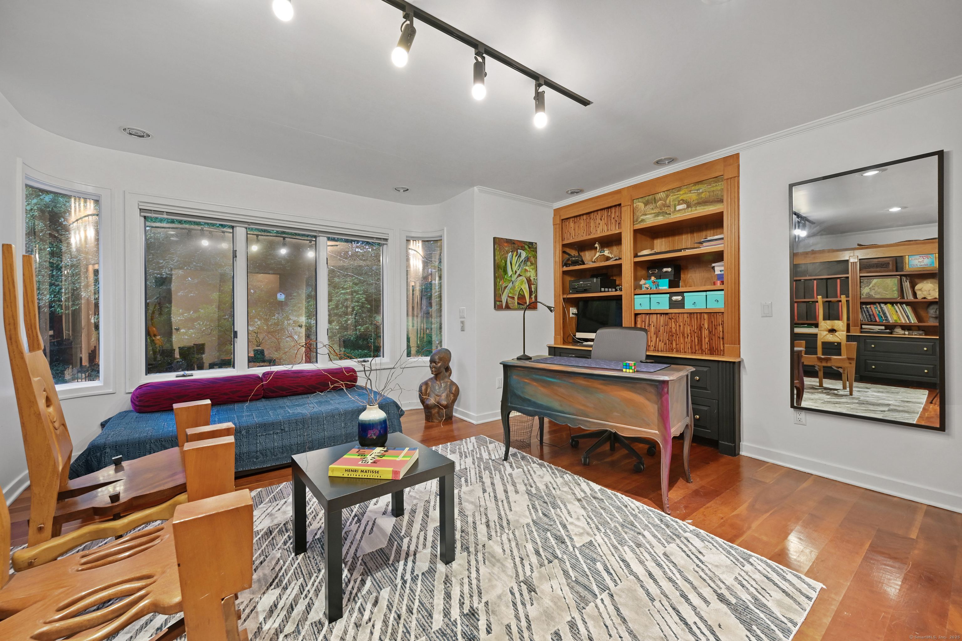61 Marchant Road Redding, CT 06896 - Photo 13 of 38 a living room with furniture and wooden floor