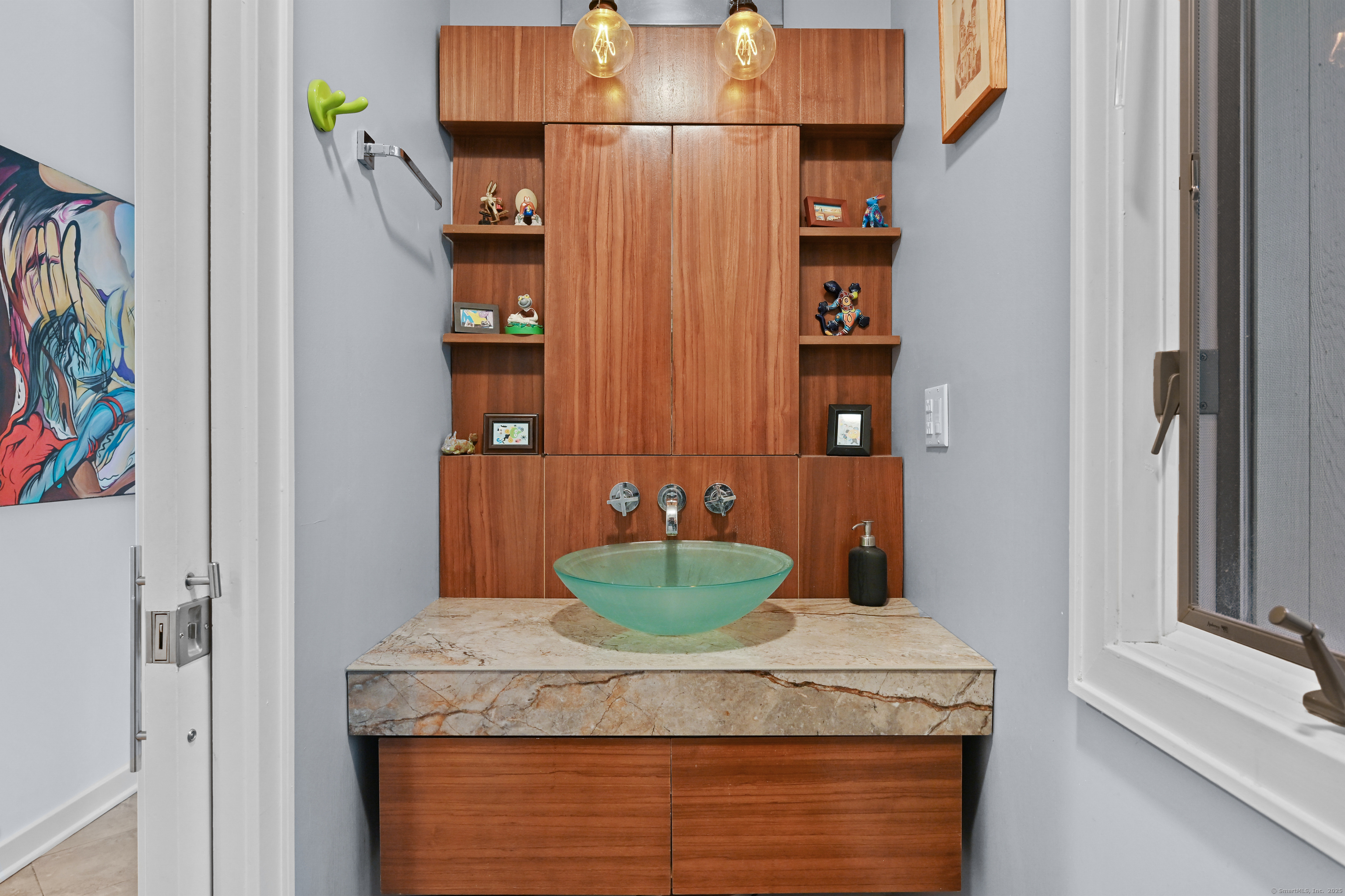 61 Marchant Road Redding, CT 06896 - Photo 14 of 38 a bathroom with a granite countertop sink and a mirror