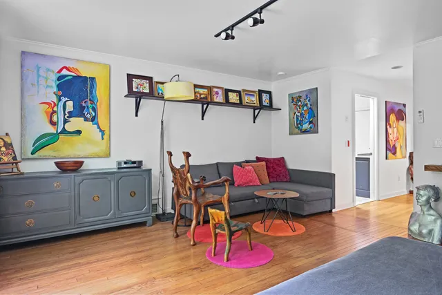 a kitchen with a table and chairs