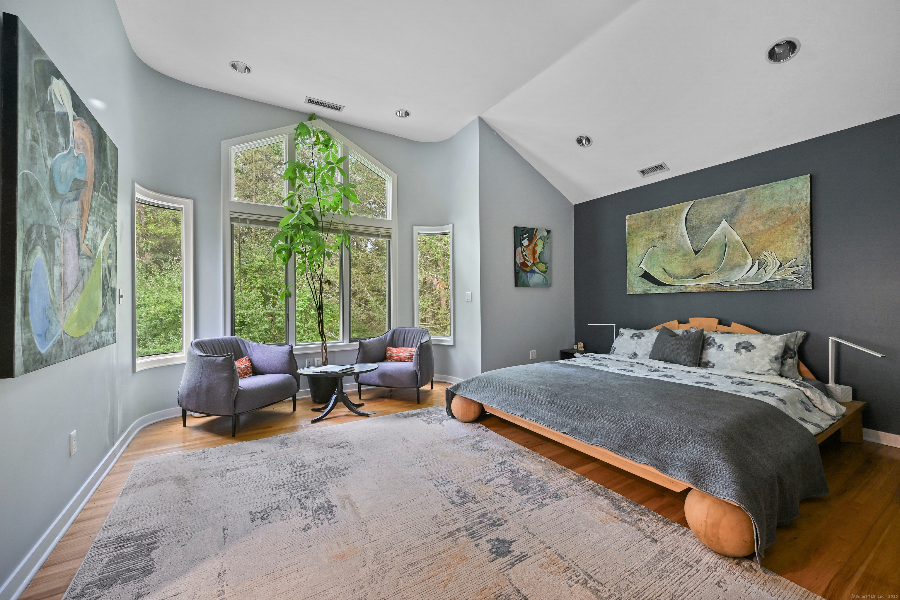 61 Marchant Road Redding, CT 06896 - Photo 22 of 38 a bed room with a bed and large windows