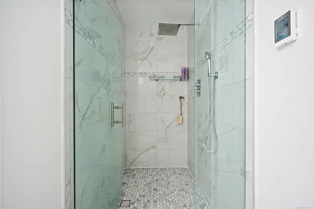 a bathroom with a sink and a shower