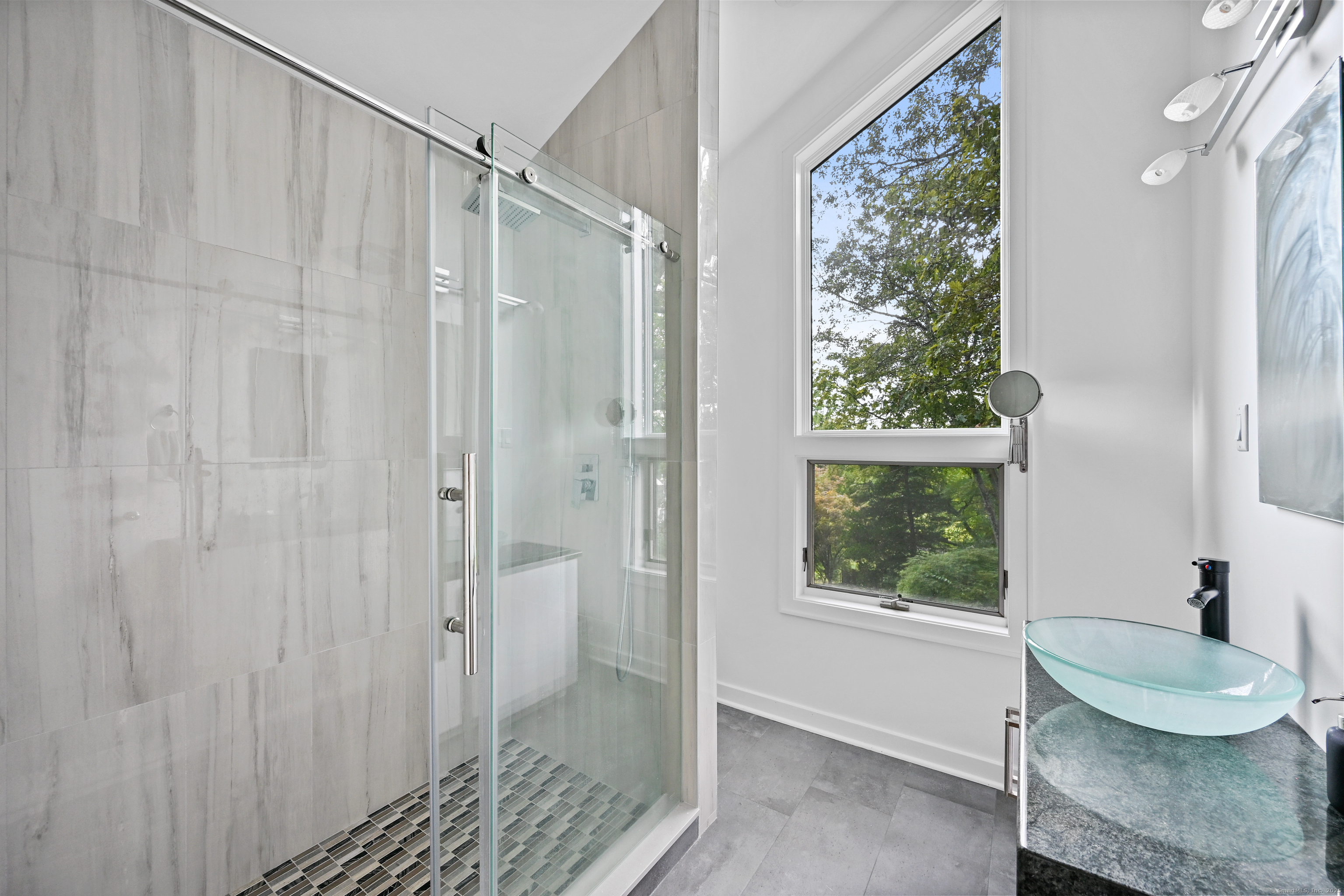 61 Marchant Road Redding, CT 06896 - Photo 26 of 38 a bathroom with a sink and a shower