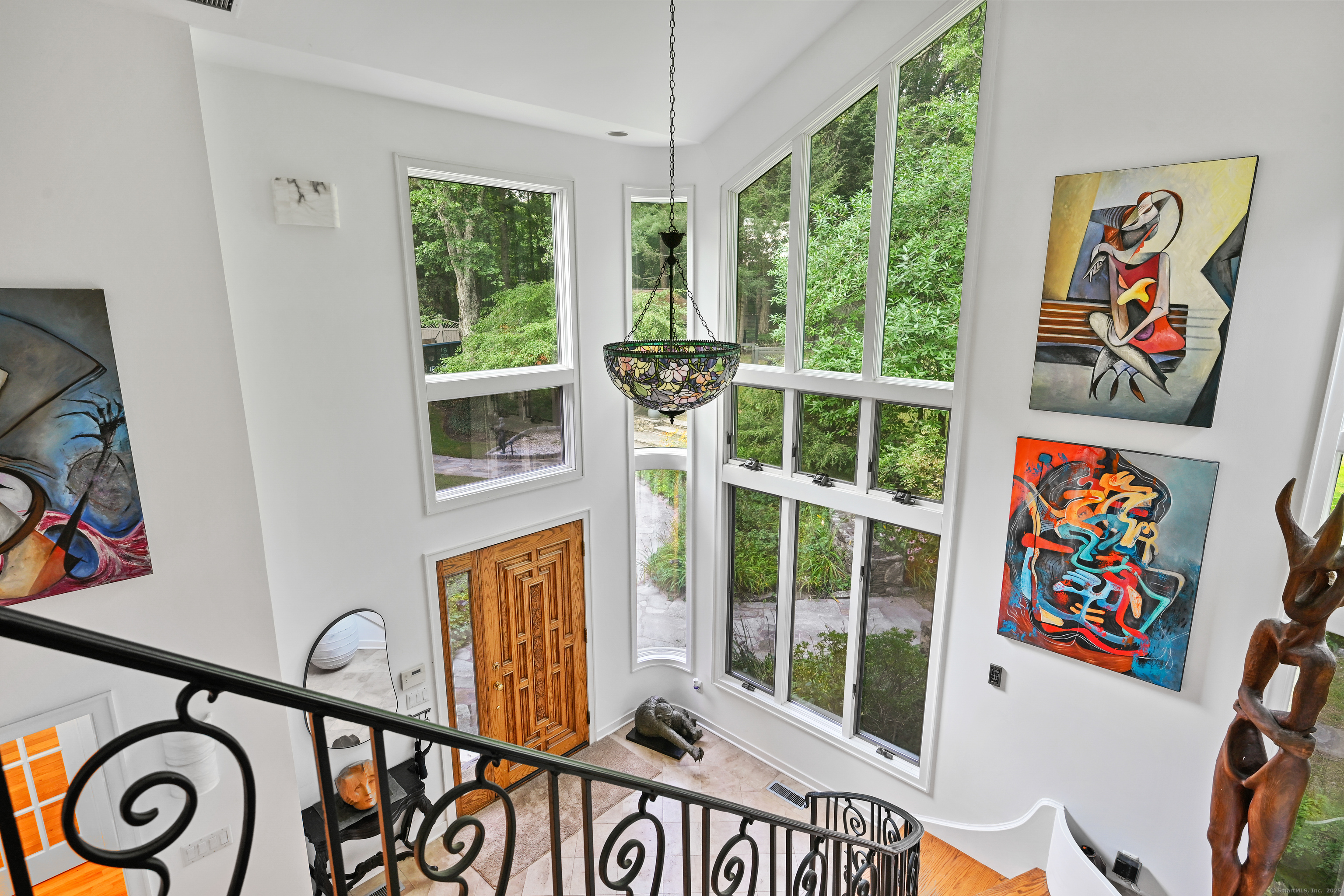 61 Marchant Road Redding, CT 06896 - Photo 28 of 38 a view of an entryway with a lot of windows