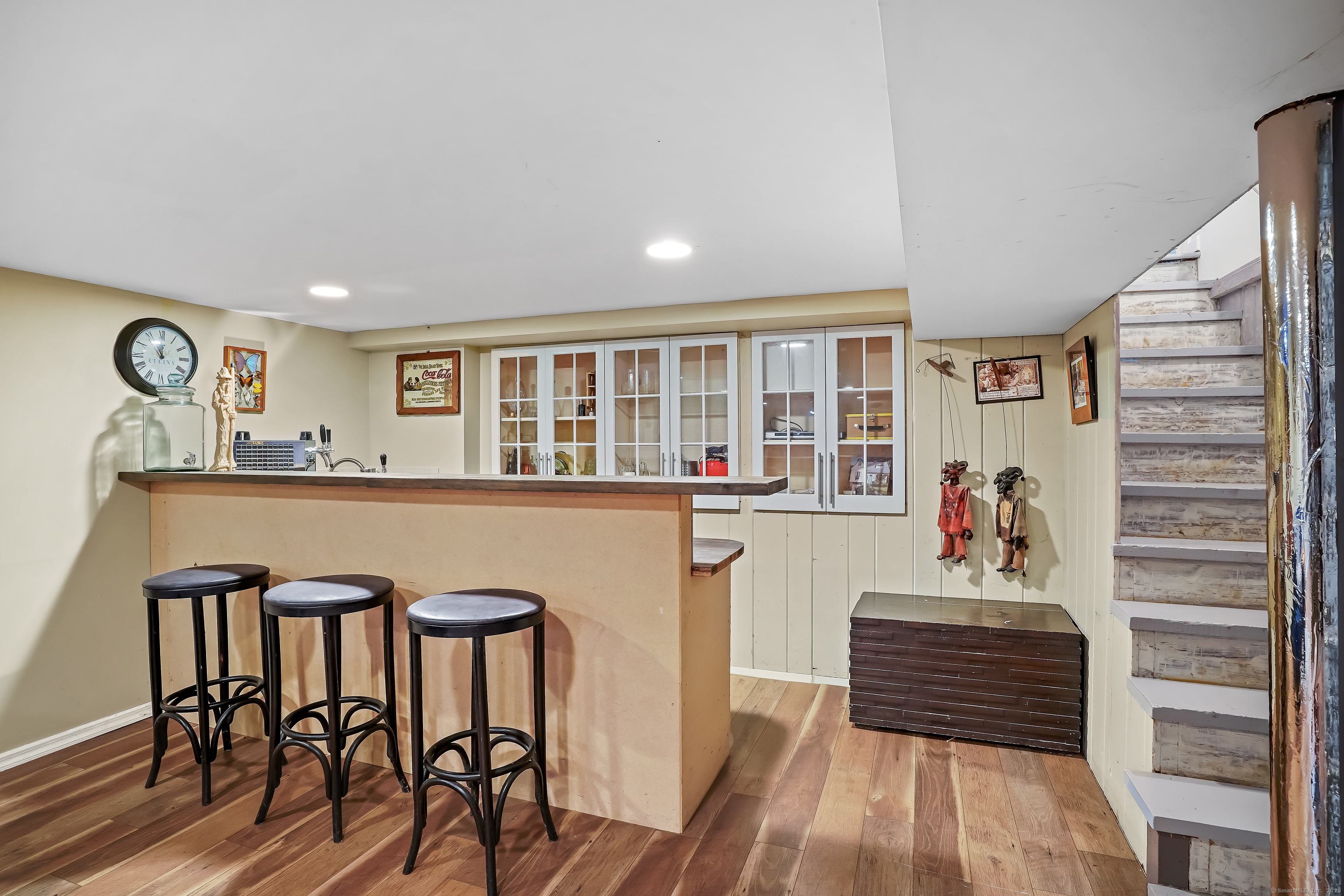 61 Marchant Road Redding, CT 06896 - Photo 30 of 38 a view of a dining room with furniture window and wooden floor
