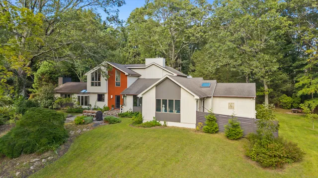front view of a house with a yard