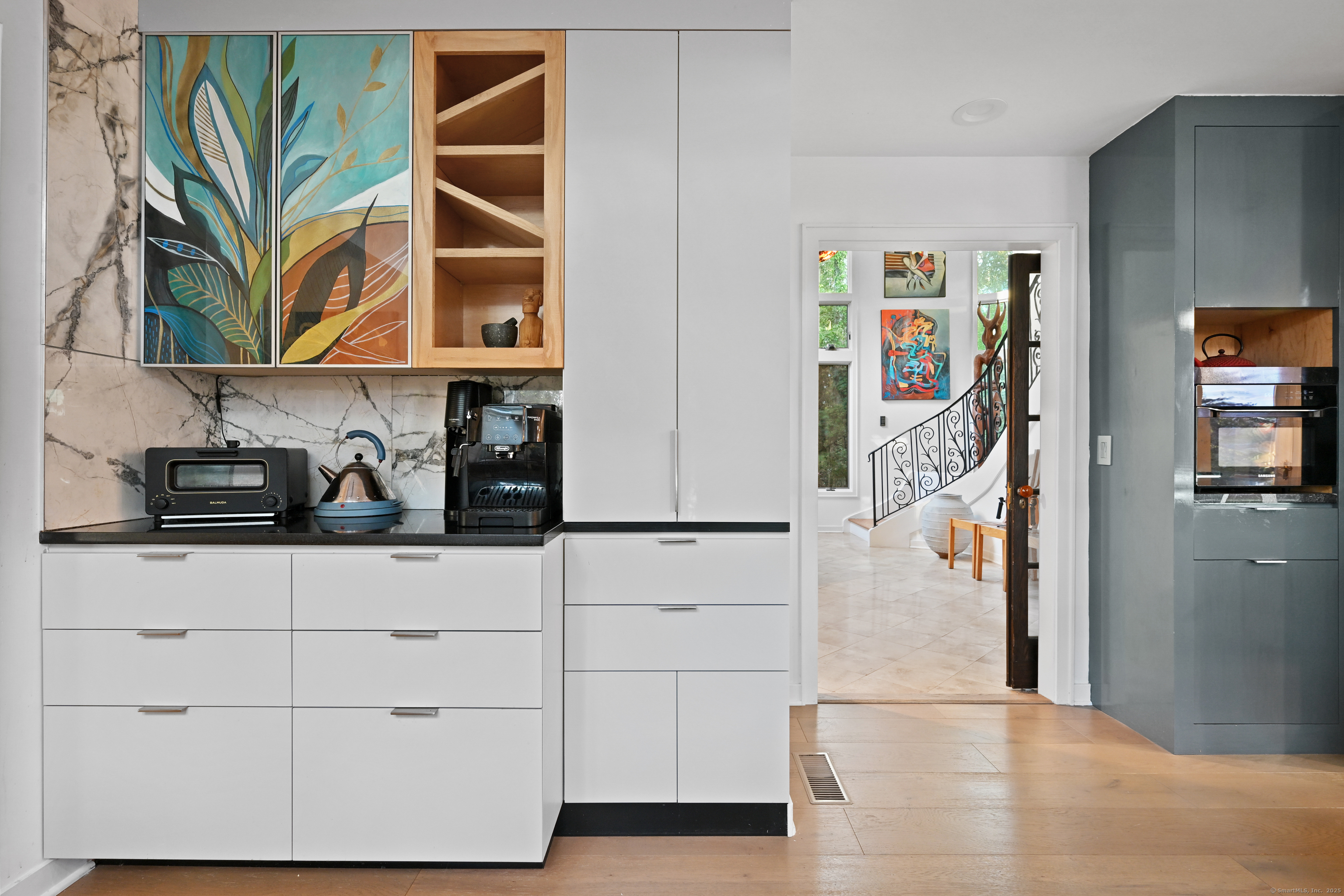 61 Marchant Road Redding, CT 06896 - Photo 7 of 38 a kitchen with stainless steel appliances a refrigerator and cabinets