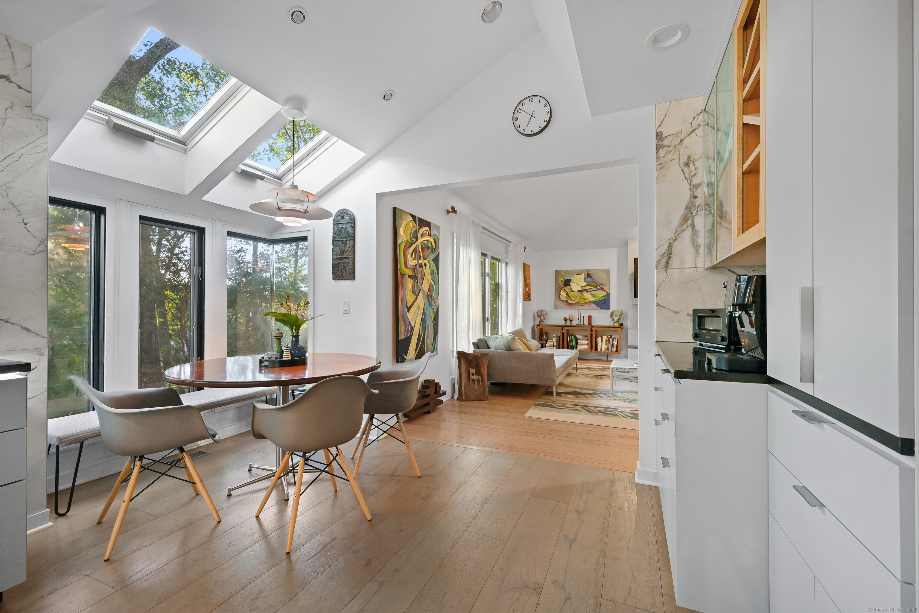 61 Marchant Road Redding, CT 06896 - Photo 9 of 38 a living room with furniture and a large window