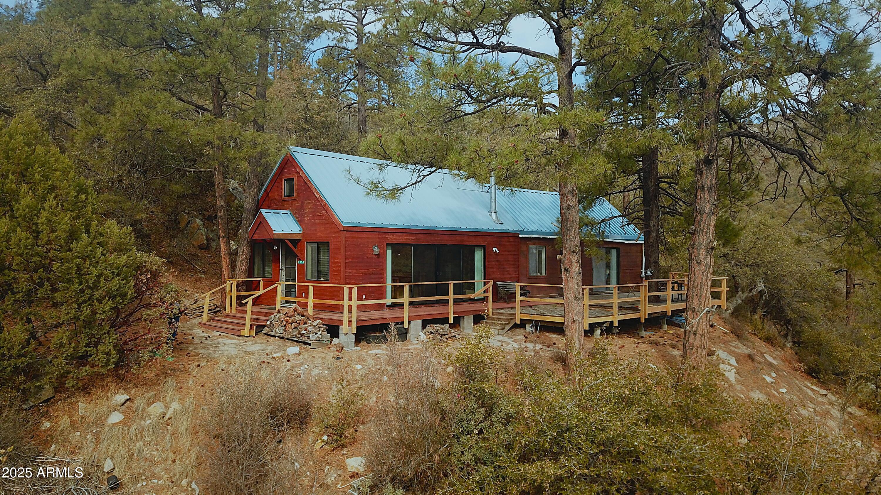 6358 Mountain View Road Crown King, AZ 86343 - Photo 1 of 42 an outdoor space with patio