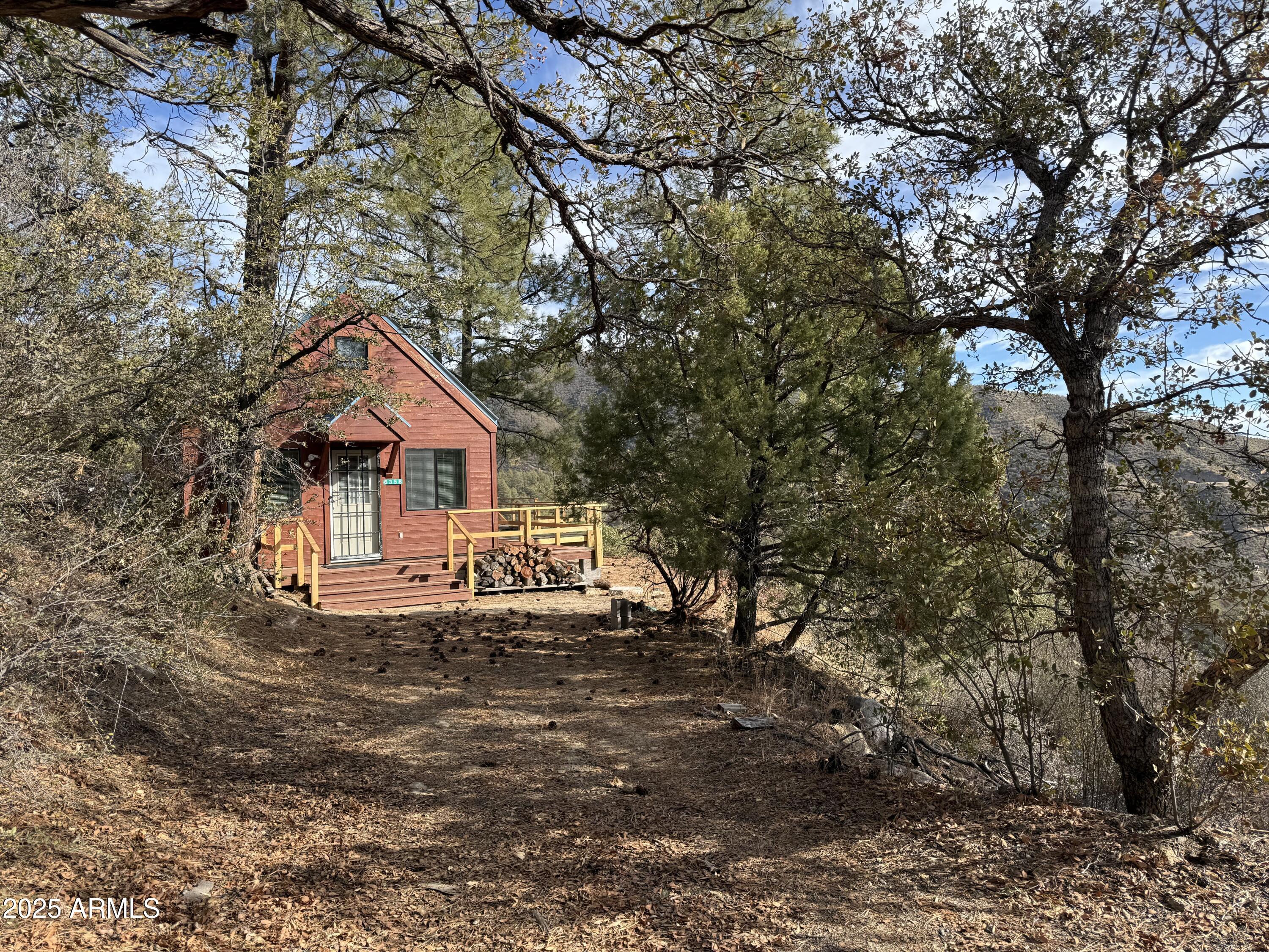 6358 Mountain View Road Crown King, AZ 86343 - Photo 15 of 42 a view of house with backyard