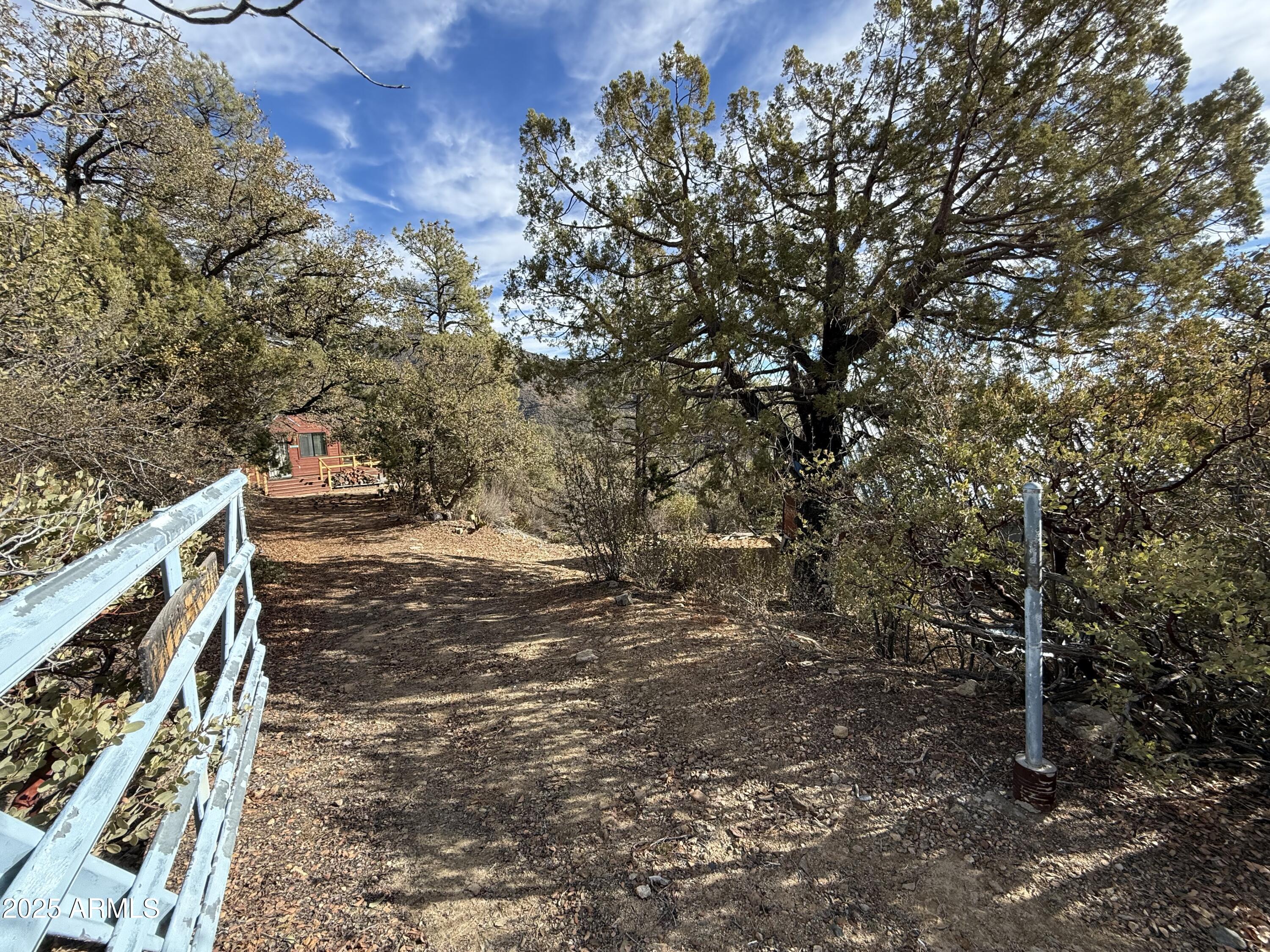 6358 Mountain View Road Crown King, AZ 86343 - Photo 16 of 42 a view of an outdoor space with trees