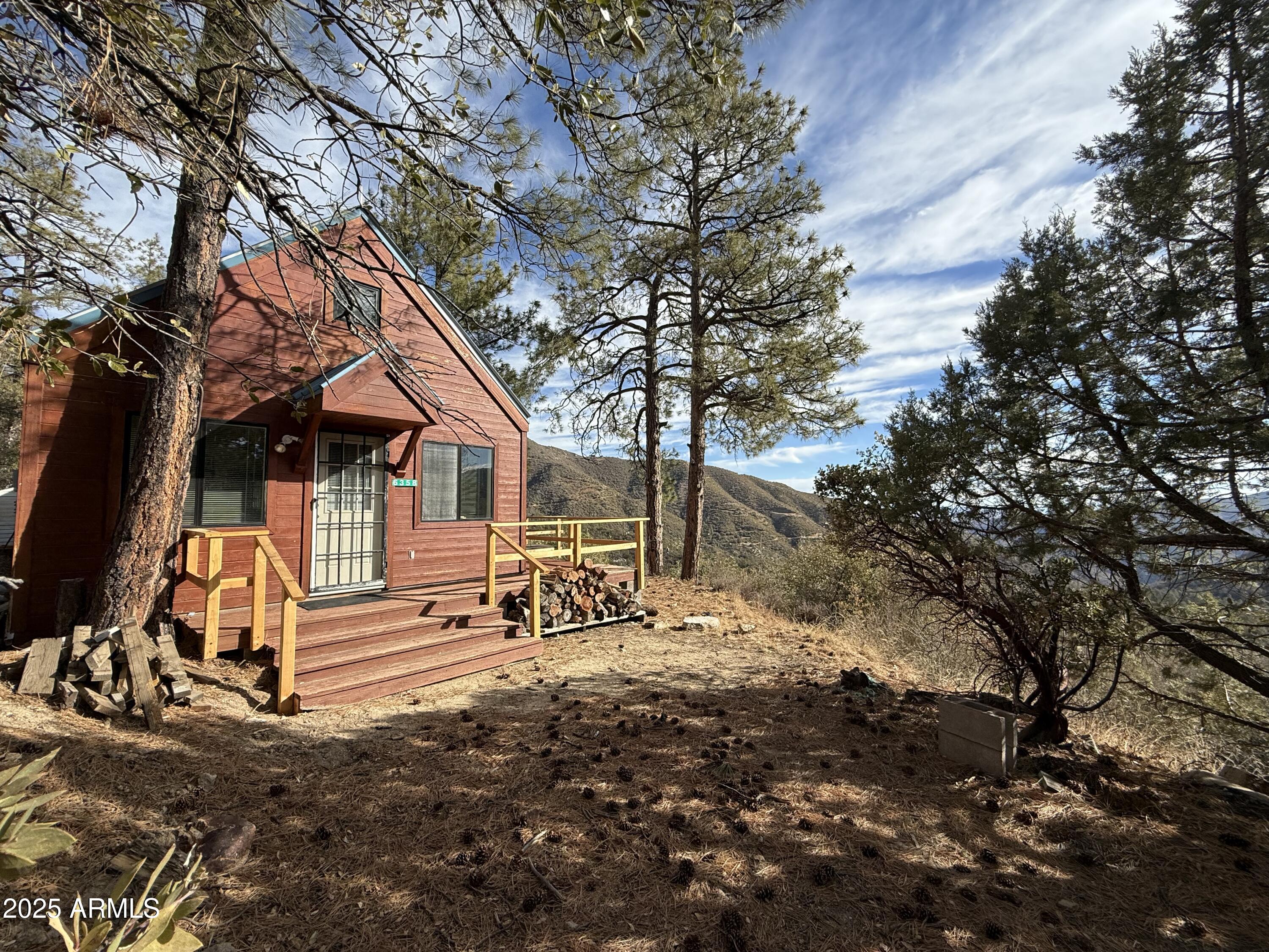 6358 Mountain View Road Crown King, AZ 86343 - Photo 2 of 42 an outdoor space with seating