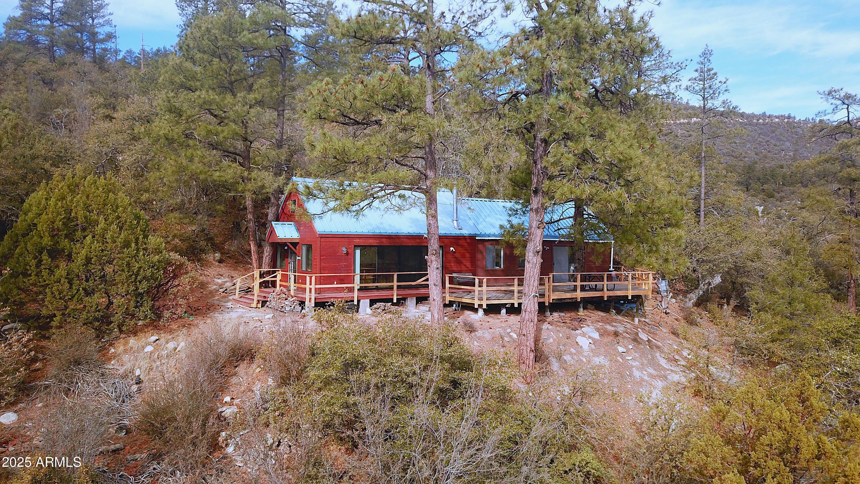 6358 Mountain View Road Crown King, AZ 86343 - Photo 42 of 42 an outdoor space with seating