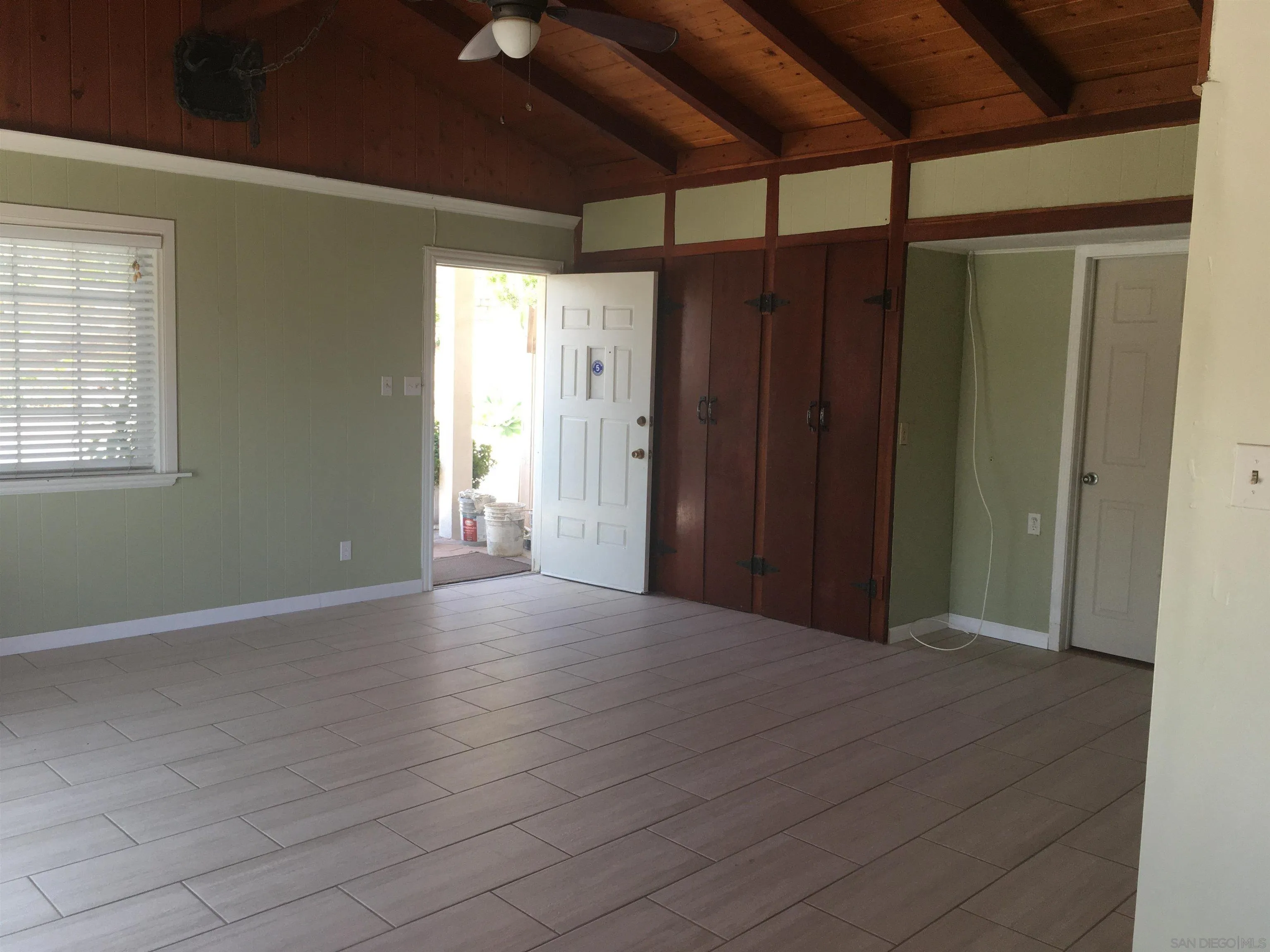 14631 Twin Peaks Road Poway, CA 92064 - Photo 2 of 12 a view of an empty room with wooden floor